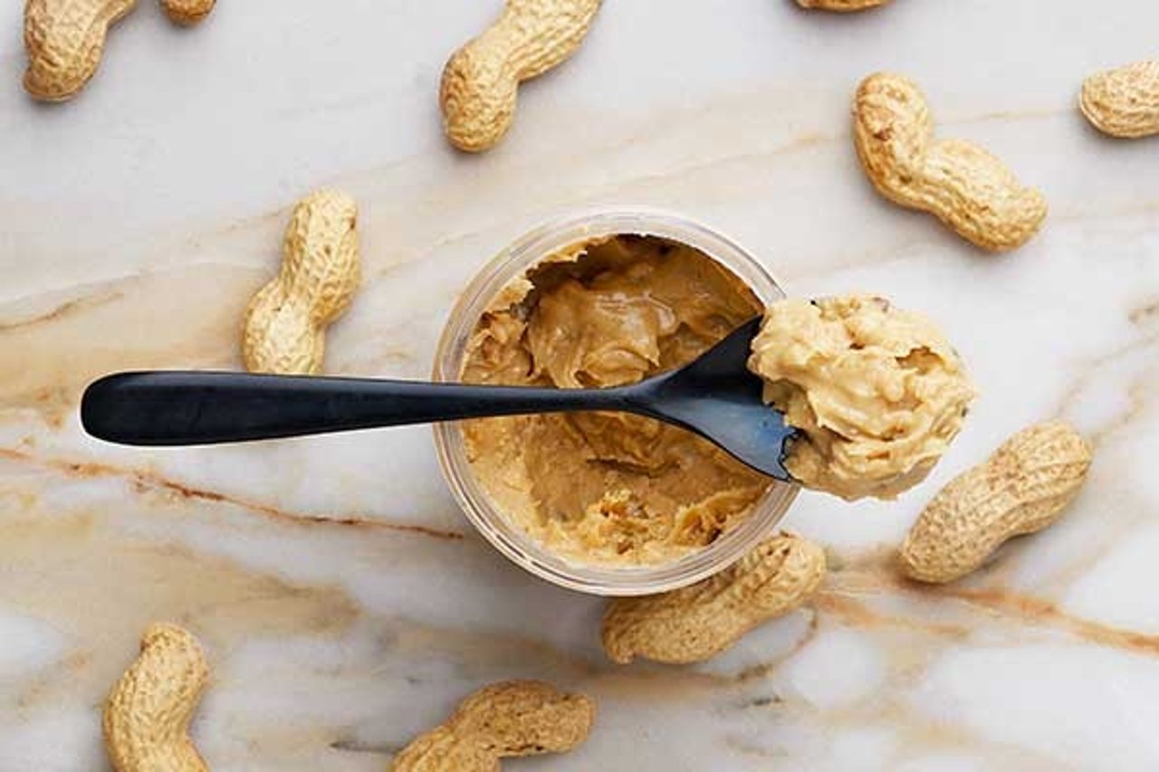 crunchy peanut butter on a spoon