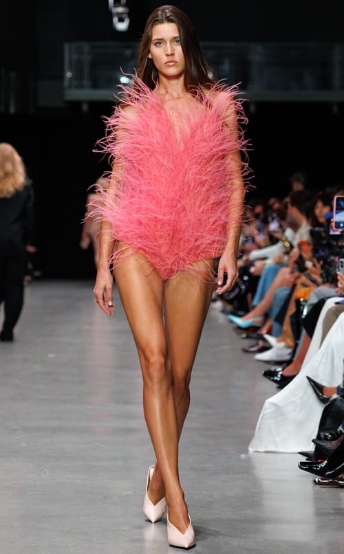 Model walks the runway with faux feathers, FEVVERS debuts at Paris Fashion Week 2026