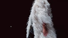 Fashion details of Haute couture white ostrich feather coat
